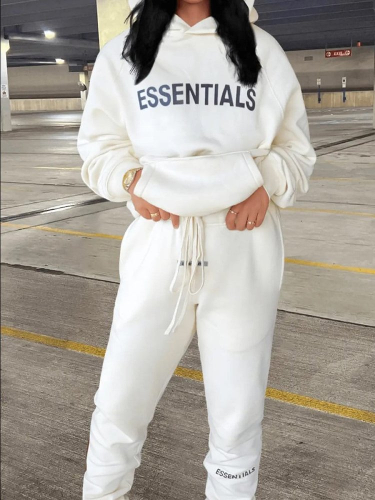 Embrace Comfort and Style with the Pink Essentials Hoodie