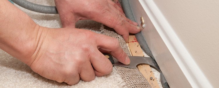Revive Your Flooring: Expert Carpet Stretching & Repair Services