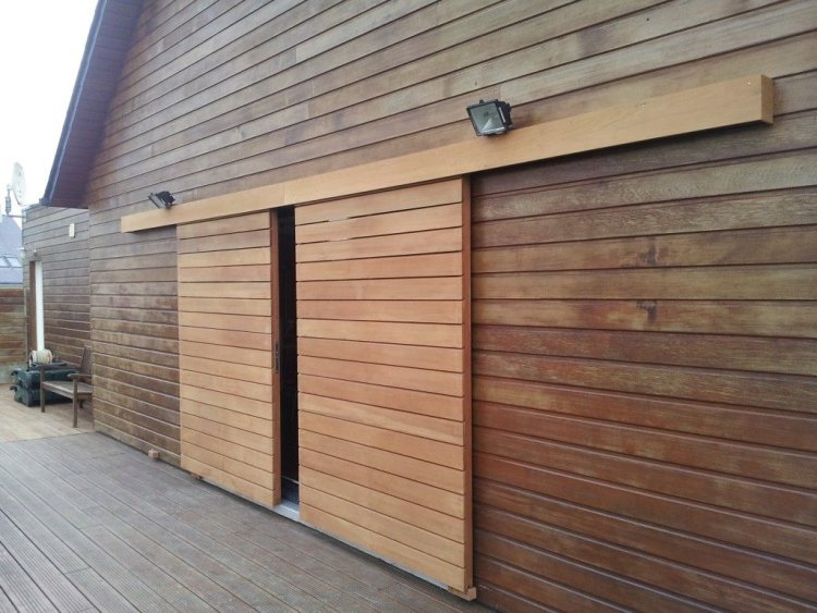 Upgrade Your Home with Insulated and Cedar Garage Doors